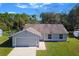 Aerial view of a single story home with yard at 637 Twin Lake Ave, Deltona, FL 32738