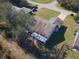 Aerial view showing house, yard, and screened patio at 637 Twin Lake Ave, Deltona, FL 32738