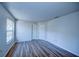 Spacious bedroom with wood-look flooring and neutral walls at 637 Twin Lake Ave, Deltona, FL 32738