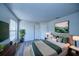 Relaxing bedroom features calming decor and laminate flooring, creating a tranquil retreat at 637 Twin Lake Ave, Deltona, FL 32738