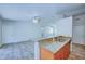 Kitchen with granite countertops, stainless steel appliances, and ample cabinetry at 637 Twin Lake Ave, Deltona, FL 32738
