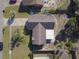 House with a large backyard, single story, and covered patio, from an aerial view at 824 Mentmore Cir, Deltona, FL 32738