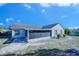 Home's exterior, highlighting the screened porch and backyard at 824 Mentmore Cir, Deltona, FL 32738