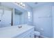 Clean bathroom with white vanity, mirror, and tiled shower/tub combo at 824 Mentmore Cir, Deltona, FL 32738