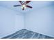Spacious bedroom with ceiling fan and double door closet at 824 Mentmore Cir, Deltona, FL 32738