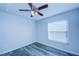 Well-lit bedroom featuring ceiling fan and window blinds at 824 Mentmore Cir, Deltona, FL 32738