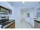 Kitchen with stainless steel appliances and white cabinets at 824 Mentmore Cir, Deltona, FL 32738