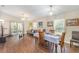 Dining area with hardwood floors and a table for four at 11 Ginger Cir, Leesburg, FL 34748