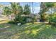 Backyard with pool and screened enclosure at 1265 Lake Francis Dr, Apopka, FL 32712