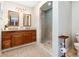 Bathroom with double vanity and walk-in shower at 1265 Lake Francis Dr, Apopka, FL 32712