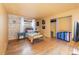 Small bedroom with wood-paneled accent wall at 1265 Lake Francis Dr, Apopka, FL 32712