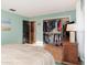 Bedroom with a walk-in closet and hardwood floors at 1265 Lake Francis Dr, Apopka, FL 32712
