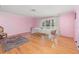 Bright dining room with hardwood floors and a view to the front yard at 1265 Lake Francis Dr, Apopka, FL 32712