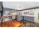 Updated kitchen featuring blue cabinets and wood countertops at 1265 Lake Francis Dr, Apopka, FL 32712