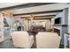 Spacious living room with exposed beams, fireplace, and comfortable seating at 1265 Lake Francis Dr, Apopka, FL 32712