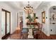 Dining room showcasing a chandelier, hardwood floors, and seating for six at 1426 Nottingham St, Orlando, FL 32803