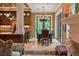 Elegant dining room adjacent to kitchen with access to backyard at 1426 Nottingham St, Orlando, FL 32803