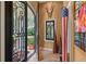 Grand entryway with ornate iron door and high ceilings at 1426 Nottingham St, Orlando, FL 32803