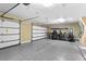 Spacious garage with golf cart and epoxy flooring at 1426 Nottingham St, Orlando, FL 32803