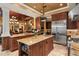 Gourmet kitchen with granite countertops and stainless steel appliances at 1426 Nottingham St, Orlando, FL 32803