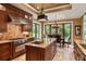 Large kitchen with island, breakfast bar, and eat-in area at 1426 Nottingham St, Orlando, FL 32803