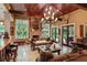 Spacious living area with a fireplace and access to the outdoors at 1426 Nottingham St, Orlando, FL 32803