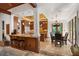 Open floor plan showcases the kitchen, dining area, and breakfast bar, perfect for entertaining guests at 1426 Nottingham St, Orlando, FL 32803
