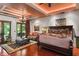 Main bedroom featuring hardwood floors, stylish decor, and a ceiling fan for added comfort at 1426 Nottingham St, Orlando, FL 32803