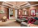 Sophisticated media room with comfortable seating and large screen TV at 1426 Nottingham St, Orlando, FL 32803