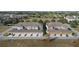 Aerial view showcasing townhouses with attached garages at 15322 Murcott Blossom Blvd, Winter Garden, FL 34787
