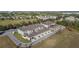 Aerial view of townhouses, highlighting their location and design at 15322 Murcott Blossom Blvd, Winter Garden, FL 34787