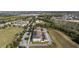 Aerial view of townhouses with lake views at 15322 Murcott Blossom Blvd, Winter Garden, FL 34787