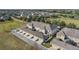 Aerial view of townhome community, showcasing building and landscape at 15322 Murcott Blossom Blvd, Winter Garden, FL 34787