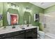 Modern bathroom with double vanity and large shower at 15322 Murcott Blossom Blvd, Winter Garden, FL 34787