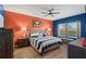 Spacious bedroom with wood floors and stylish decor at 15322 Murcott Blossom Blvd, Winter Garden, FL 34787