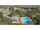 Community pool with a pavilion and lounge chairs at 15322 Murcott Blossom Blvd, Winter Garden, FL 34787