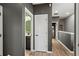 Clean and bright hallway with access to bathroom at 15322 Murcott Blossom Blvd, Winter Garden, FL 34787
