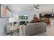 Spacious living room open to kitchen and dining area at 15322 Murcott Blossom Blvd, Winter Garden, FL 34787