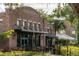 Plant Street Market, showcasing outdoor seating and brick building architecture at 15322 Murcott Blossom Blvd, Winter Garden, FL 34787