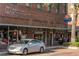 Plant Street shops and boutiques, showcasing local businesses and a parked car at 15322 Murcott Blossom Blvd, Winter Garden, FL 34787