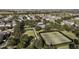 Aerial view of community tennis courts and pool at 15322 Murcott Blossom Blvd, Winter Garden, FL 34787