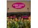 Pet grooming and bakery shop with bright signage at 15322 Murcott Blossom Blvd, Winter Garden, FL 34787