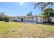 Newly renovated home with a large backyard and patio at 1639 Hialeah St, Orlando, FL 32808