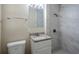 Updated bathroom with granite vanity and shower at 1639 Hialeah St, Orlando, FL 32808