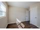 Sunny bedroom with hardwood floors and window at 1639 Hialeah St, Orlando, FL 32808