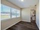 Bright dining room with hardwood floors and view of backyard at 1639 Hialeah St, Orlando, FL 32808