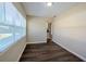 Bright dining room with hardwood floors and view of backyard at 1639 Hialeah St, Orlando, FL 32808