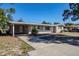 Newly remodeled home with a long driveway and well-maintained yard at 1639 Hialeah St, Orlando, FL 32808