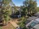 Overview of backyard, showing pool, shed, and landscaping at 3032 Harbour Landing Way, Casselberry, FL 32707