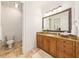 Bathroom with a large vanity and a tiled floor at 4424 New Broad St, Orlando, FL 32814